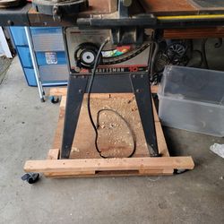 Craftsman table saw. Belt drive.
Older heavy in good condition. 
Includes wheeled base.