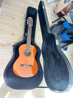 Yamaha guitar and case
