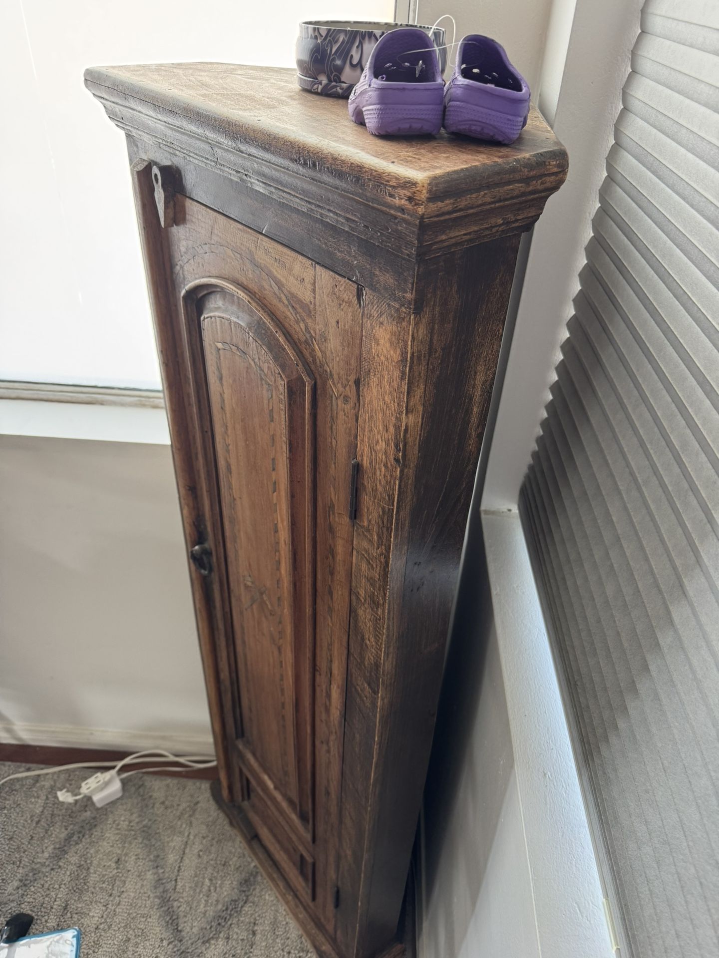 Corner carved wood armoire