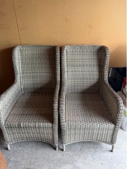 Set of patio chairs with foot stool and table