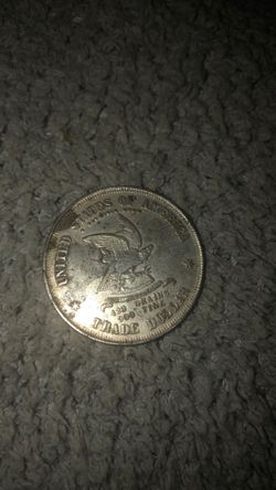 Moneda de un dollars 1873