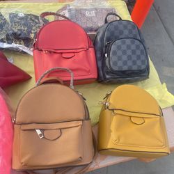 New Purses And Backpacks  $15–$25.00