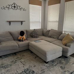 Living Spaces Sectional And Ottoman