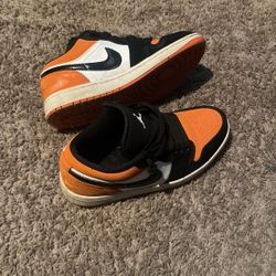 Orange Nike Air Jordan Lows