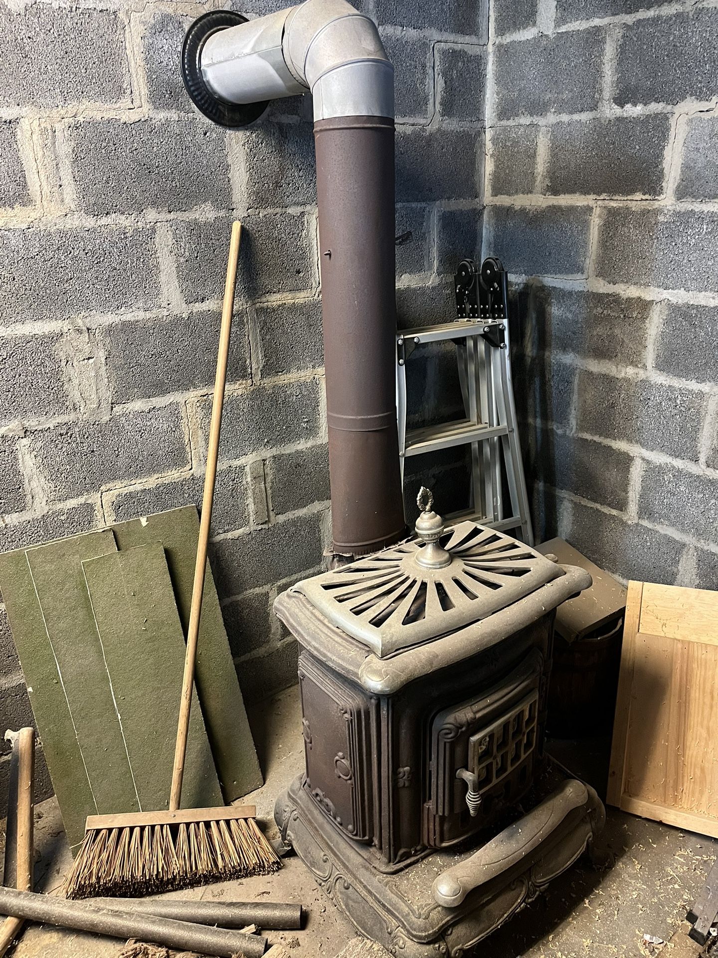 CastIron Woodstove With Pipe And Firebrick for Sale in Allentown, PA