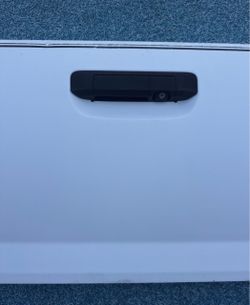 2005-2015 white Toyota Tacoma tailgate with or without camera.