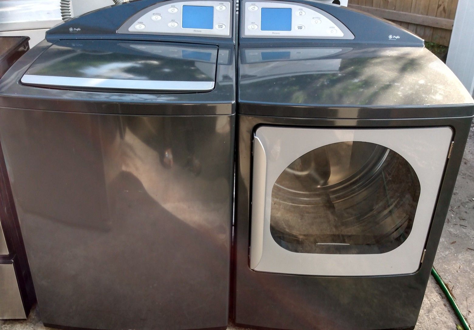 BEAUTIFUL GE PROFILE SUPER CAPACITY WASHER DRYER SET WITH STAINLESS STEEL TUB AND NO AGITATOR