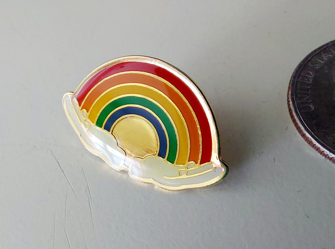 1" Gold Rainbow Lapel Shirt Dress Pin. New. Makes a great holiday Christmas gift or stocking stuffer. Ships via USPS. 

Buy 3 or more items from my st