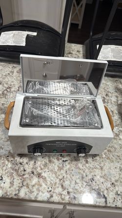 Cosmotology warming sterilizer