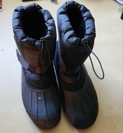 Boots size 9 Adult Black with velcro strap. Preowned in good condition.