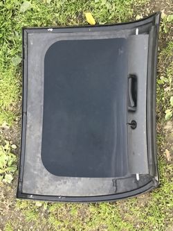 T top from 99 trans am passenger side with key.