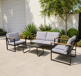 4-piece patio set with loveseat, single chairs, & coffee table