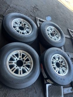 (4) 16” Trailer Wheels w/ NEW Tires Installation Included
