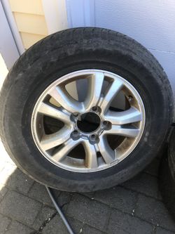 Lexus lx 470 or land cruiser tire wheel.