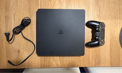 Sony PlayStation 4 (PS4) with Controller