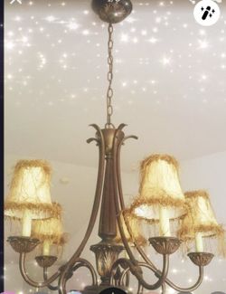 5 shaded traditional classic chandelier in great condition just wouldn't fit where I wanted to put it, Such a beautiful piece MUST HAVE!!!