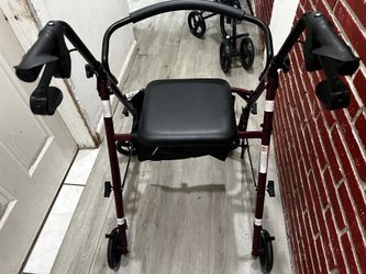 Rollator rolling seated walker