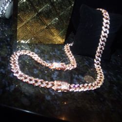 Rare Rose Red Gold One Luxury Lab Diamonds 26" Cuban Link Chain Imported 
This chain breaks down into a 18-in and bracelet set. 🌹