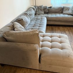 CindyCrawford Sectional sofa from Rooms To Go