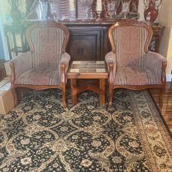 2 Chairs With A Side Table