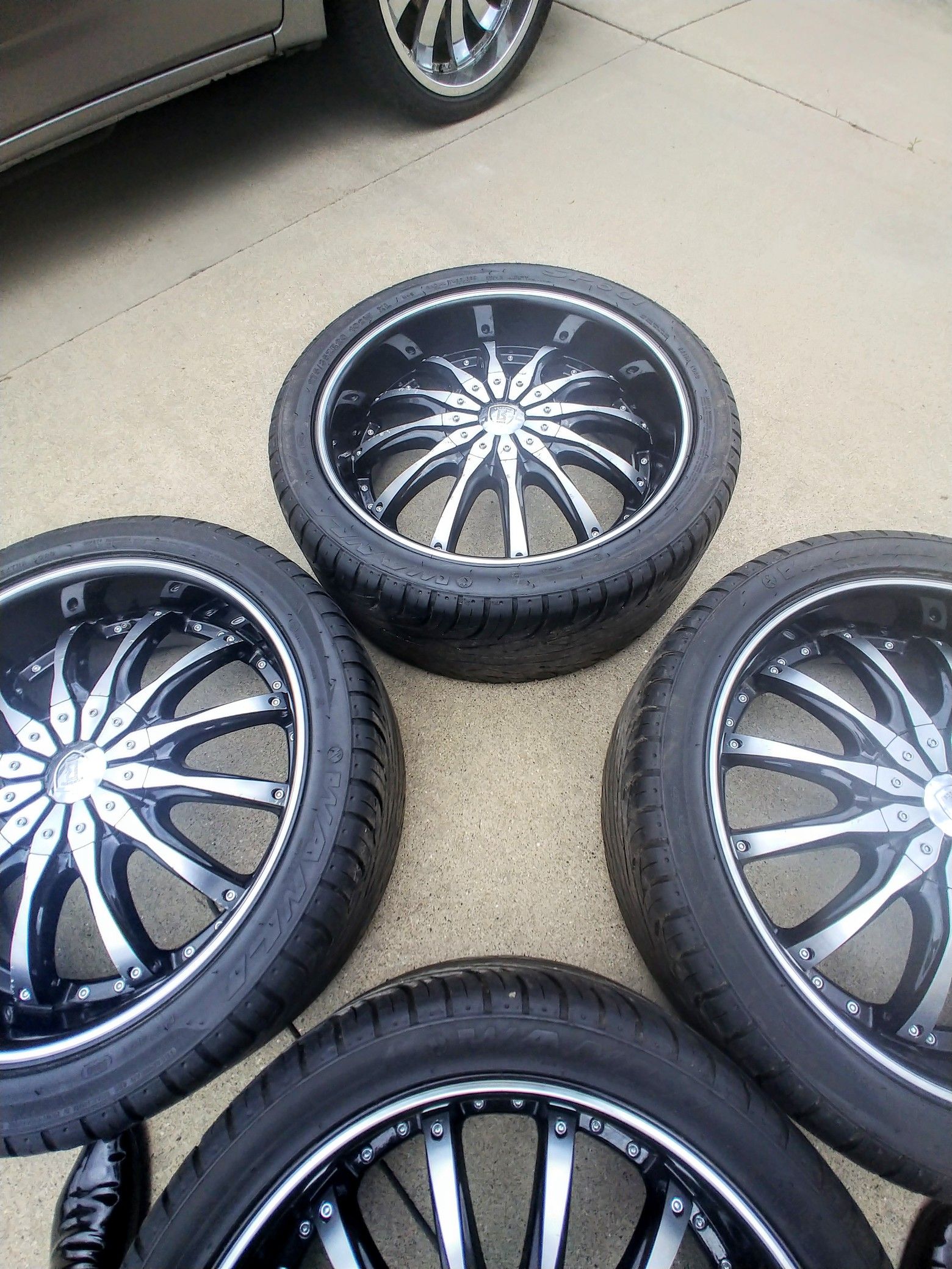 4 Black and Crome 20" Rims with tires AS a bonus deal