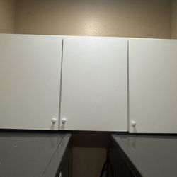 2-White Laundry/Garage cabinets