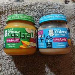 Big And Small Jars Of Baby Food 