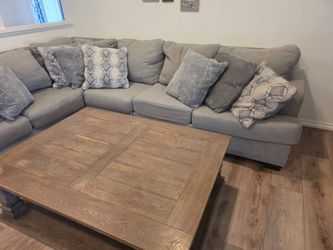 Large Gray L-Shaped Sectional Sofa with the coffee table