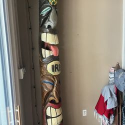 Awesome hand carved Totem or Tiki Pole.. from a palm tree heavy and solid 
