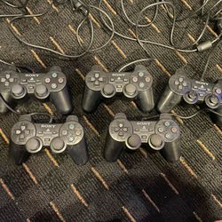 PlayStation 2 Controllers Dual Shock Qty 5 See Description   Most buttons click fine analog on a couple of them stick or won’t click. Have not been pl
