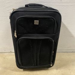 PROTEGE Black Carry-On Luggage Suitcase 2-Wheel Rolling Travel Bag  Good pre-owned condition.   Measurements:  23” Tall x 14” Wide x 9” Deep  Pick up 