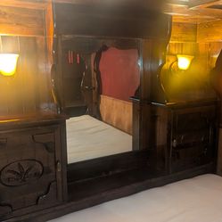 Vintage four post bed with a mirror canopy. Cal King