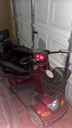 red, pre-owned Merits Pioneer 3 (model S131) 3-wheel mobility scooter.