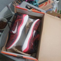 Bright Crimson Nike running shoes