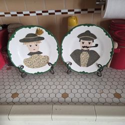 A set of vintage Folk Art fabric plates 1950s era.