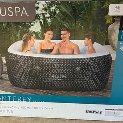 New, never out of the box Saluspa hot tub 71”X71”X26”. Holds 4/8 people,