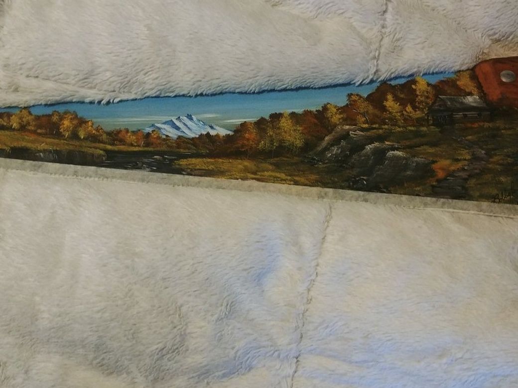 Saw With An Oil Paiting On It.