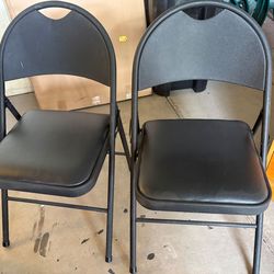 Like new padded 2 chairs