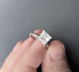 Wedding Ring. 14k White Gold and A moissanite gem Thumbnail