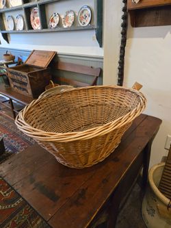 Antique large oval wicker laundry basket