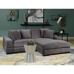 Royst 102" Wide Reversible Corner Sectional with Ottoman