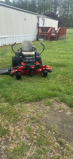 Time cutter MX 6050 60 inch cut with a Toro 24 1/2 commercial Mower with only 240 hours asking 4000