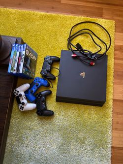 Sony PlayStation 4 Pro Bundle with Controllers and Games