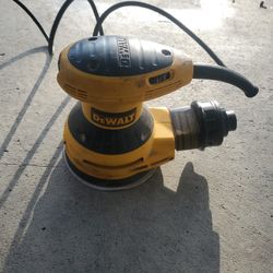 DEWALT round sander.