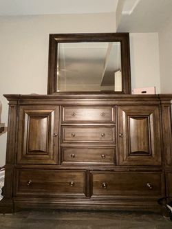 Wooden dresser with mirror