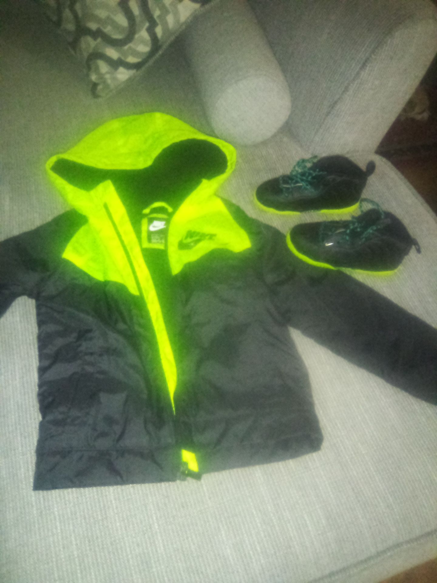 Nike tennis shoes and jacket