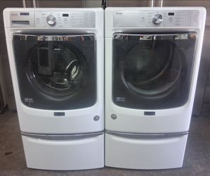 Maytag Super Capacity washer and dryer on pedestals