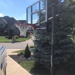 Goaliath 54 inch in ground basketball hoop, adjustable basketball court 