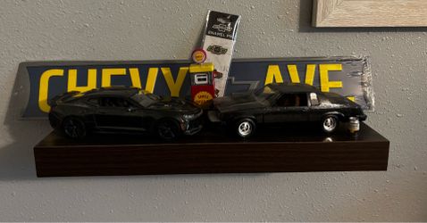 Two dark walnut floating shelves