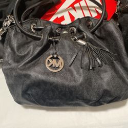 Kk purses and a coach purse